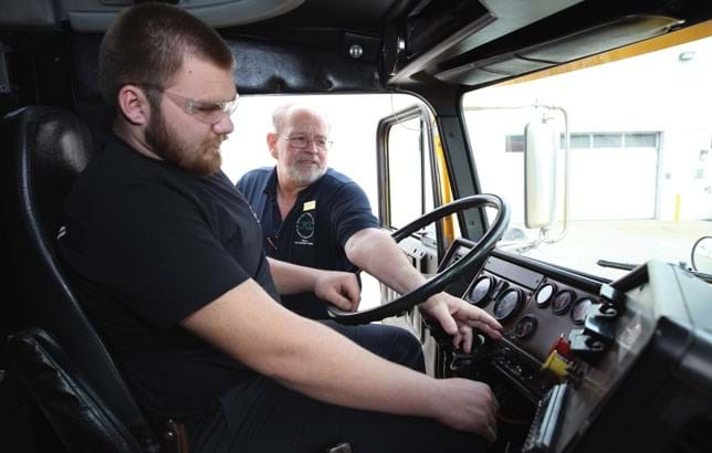 Students at Central Piedmont Community College learn their way around the engine bay.